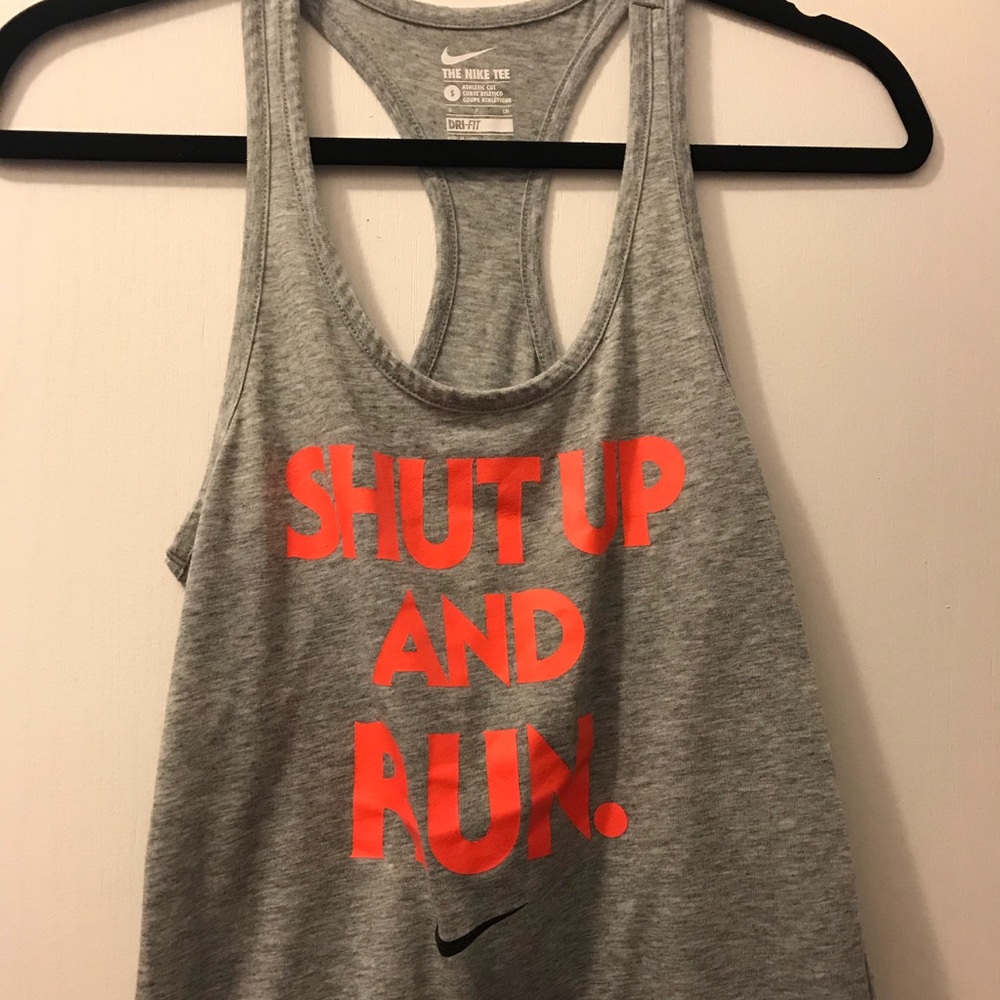 Grey running Nike tank